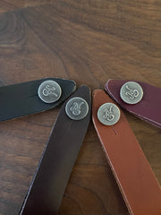 Native Sons Goods leather guitar headstock adapter straps in black brown tan and maroon with metal button closures