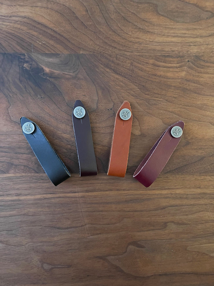 Native Sons Goods leather guitar headstock adapter in black brown tan and burgundy colors