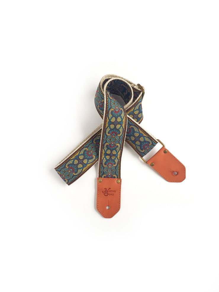 Native Sons Goods vintage style guitar strap with colorful paisley pattern and leather ends